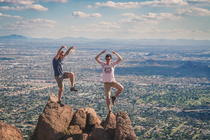 Two hiker over at the peak of Camelback Mountain's Echo Canyon