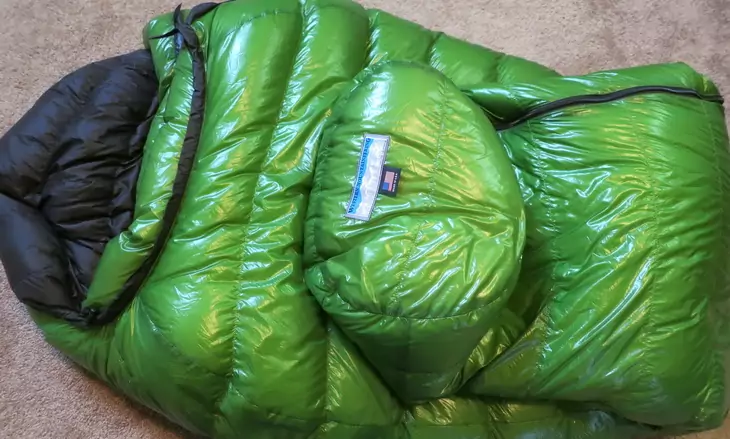 Western Mountaineering sleeping bag laying down in a house
