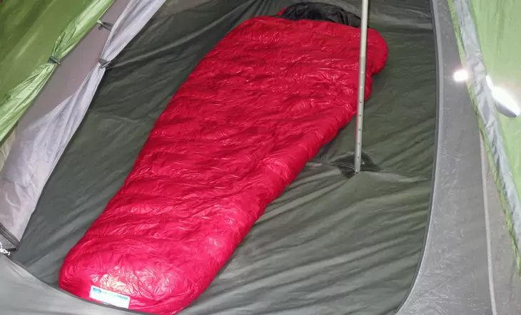 Western Mountaineering Sycamore sleeping bag laying down in a tent