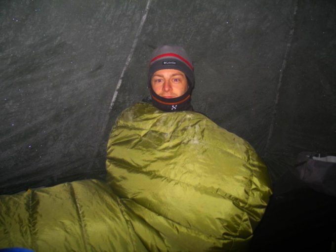 man in lynx gws in tent