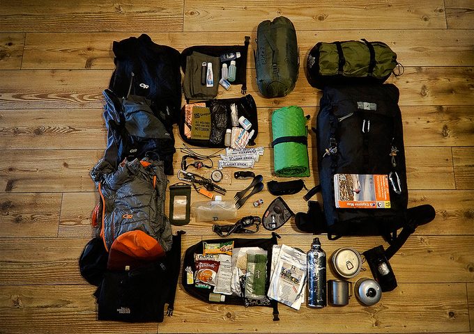 Image showing camping equipment on a wooden floor