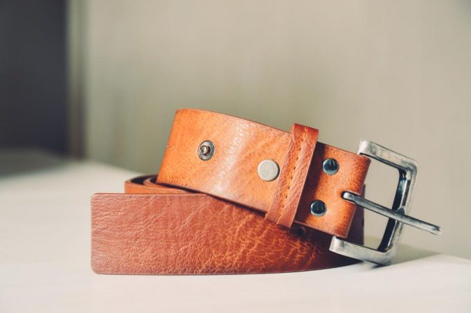 light brown belt on a wooden table