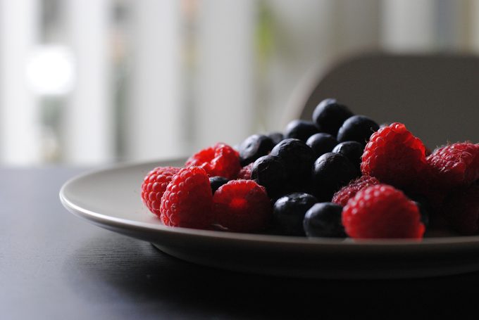Raspberries and blueberries in a bowl