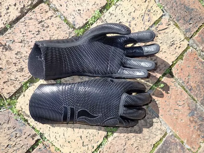 neoprene waterproof gloves on ground
