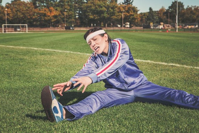 woman trying to work out too hard