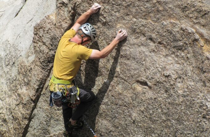 man rock climbing