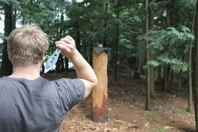 throwing knife in the woods
