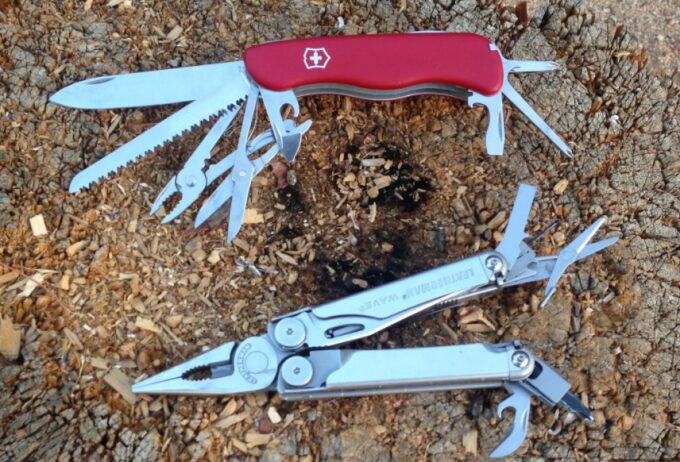 two multitools on wood